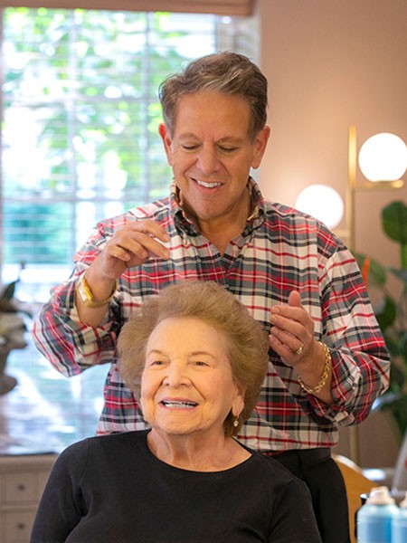 A resident getting her hair done at Spa One.